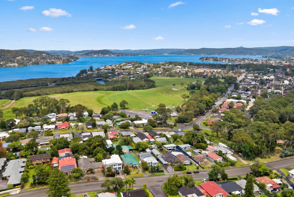 Aerial view over Springfield NSW towards Brisbane Water, with the playing fields in the foreground