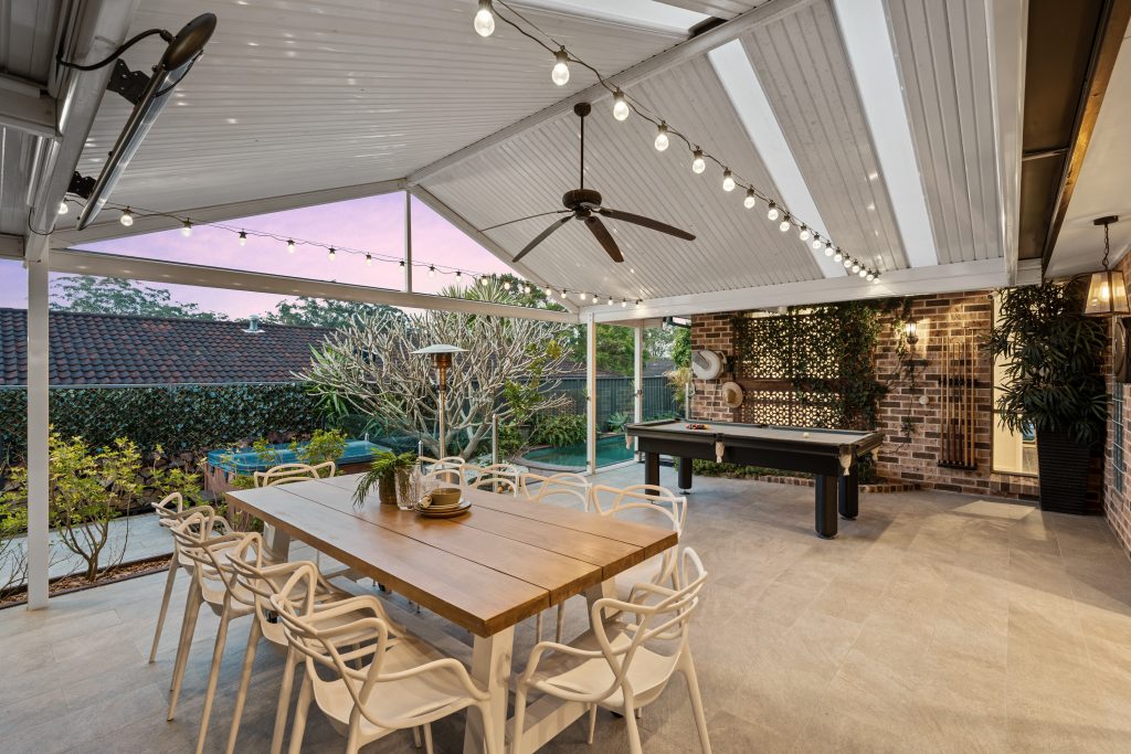Covered outdoor entertaining area with pool at a Narara NSW home