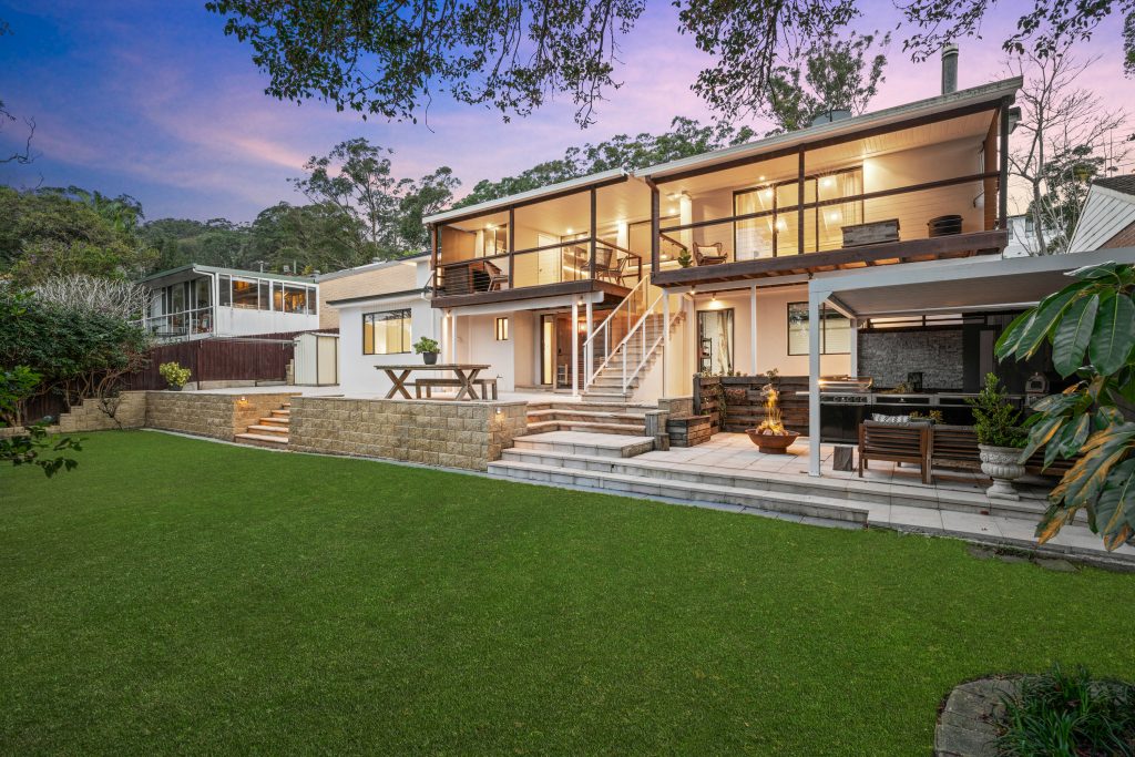A split level home with lawn and outdoor entertaining area in Wyoming NSW