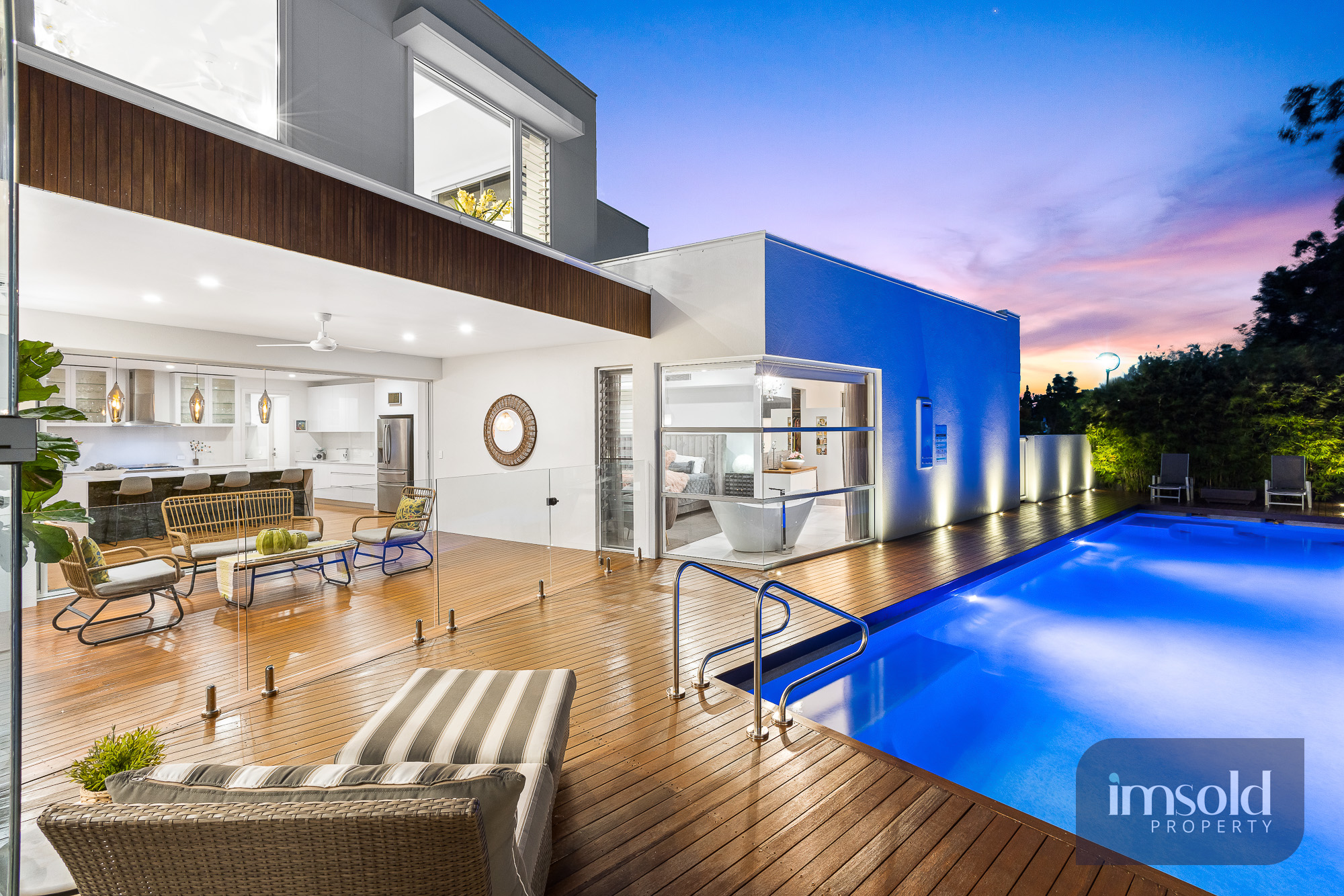 Noosa prestige home indoor outdoor living and pool at twilight