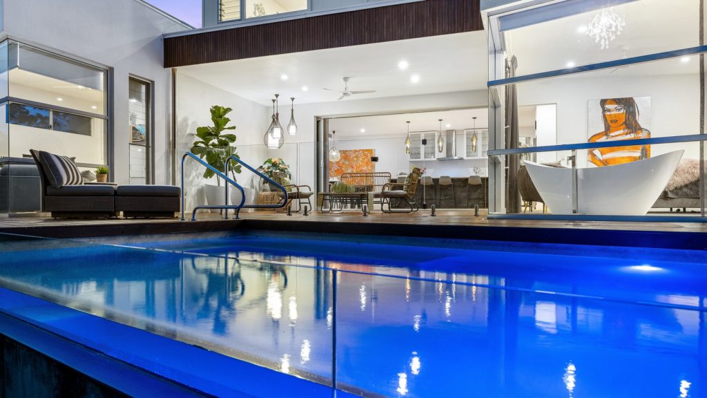 Pool and alfresco area at dusk, Noosa North Rise, Noosaville